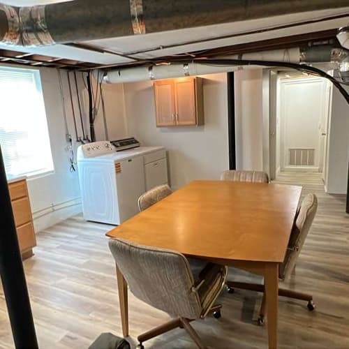 Modern kitchen renovation with custom cabinets and island