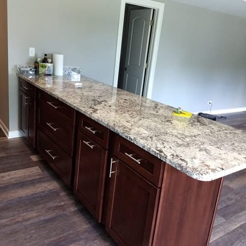Custom kitchen island with granite countertop