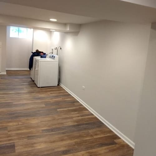 Walk-in shower with floor-to-ceiling tile